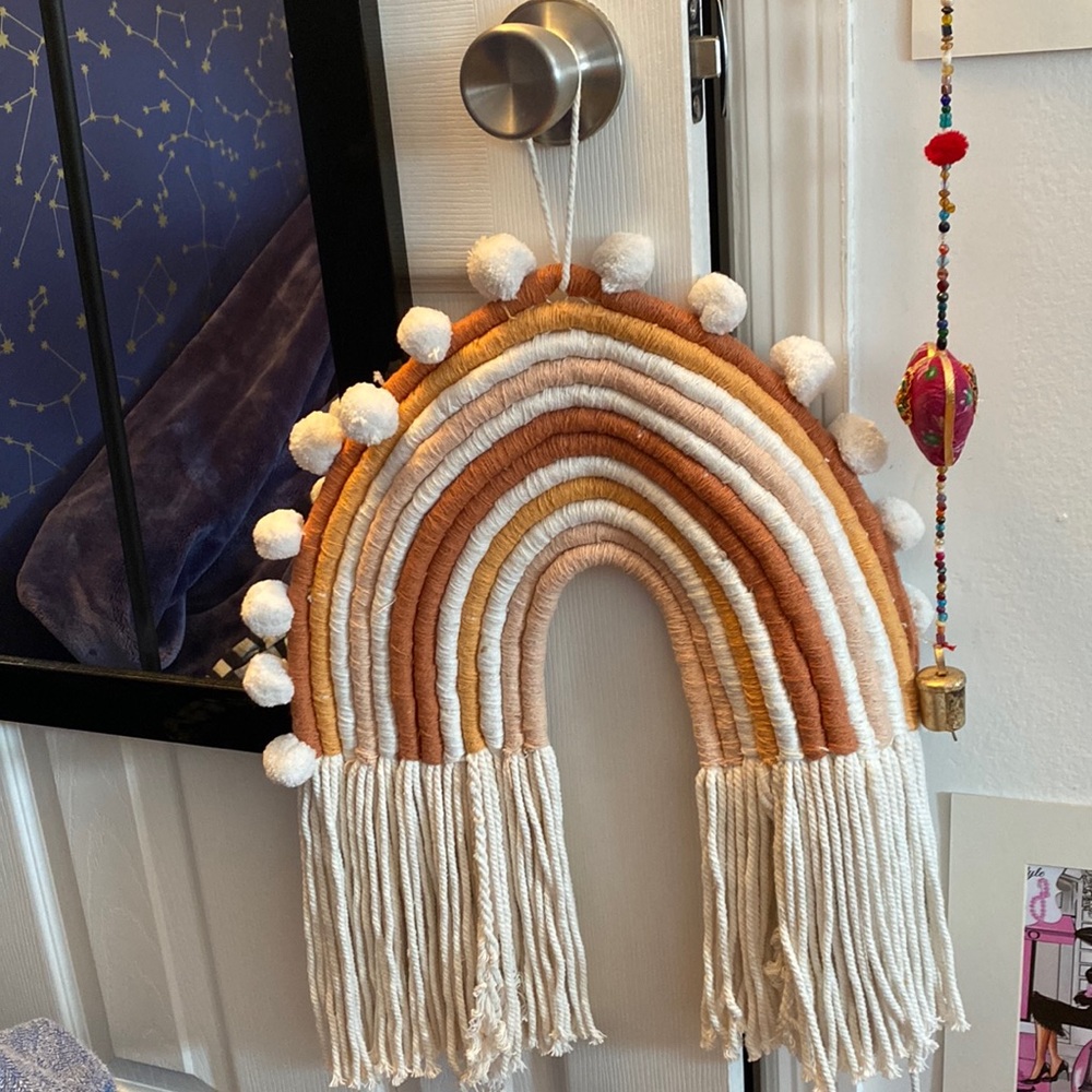 Neutral toned pom pom rainbow decor!